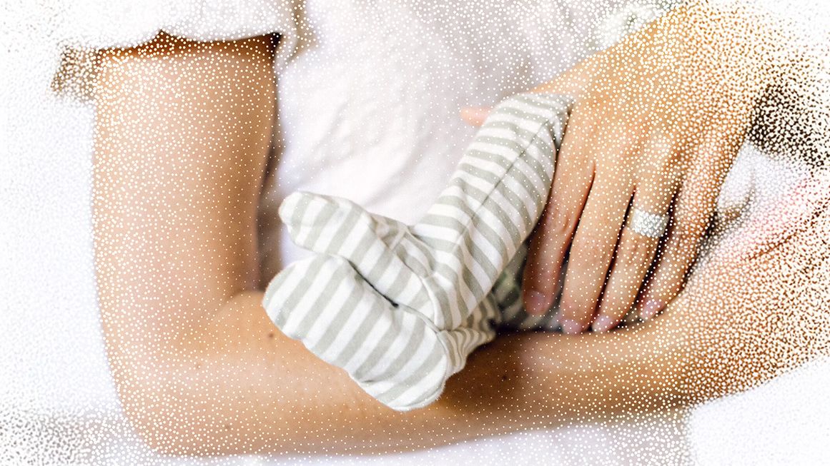 A woman holding a baby | Photo: Courtesy of Evelyn Clark