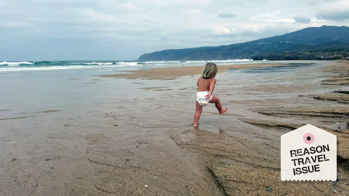 A small child walks along a beach | Photo: Courtesy of Liz Wolfe