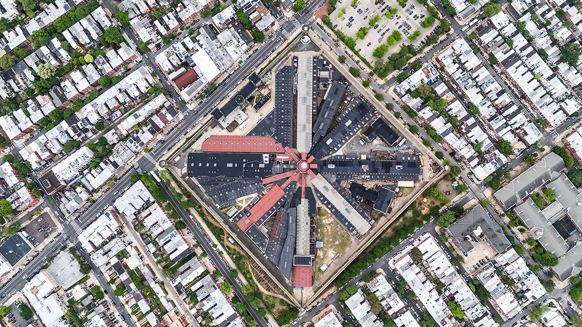 An aerial view of Eastern State Prison showing a central hub and several wings | Photo: Eastern State Penitentiary, Philadelphia, Pennsylvania; Jeremy Graham/Alamy