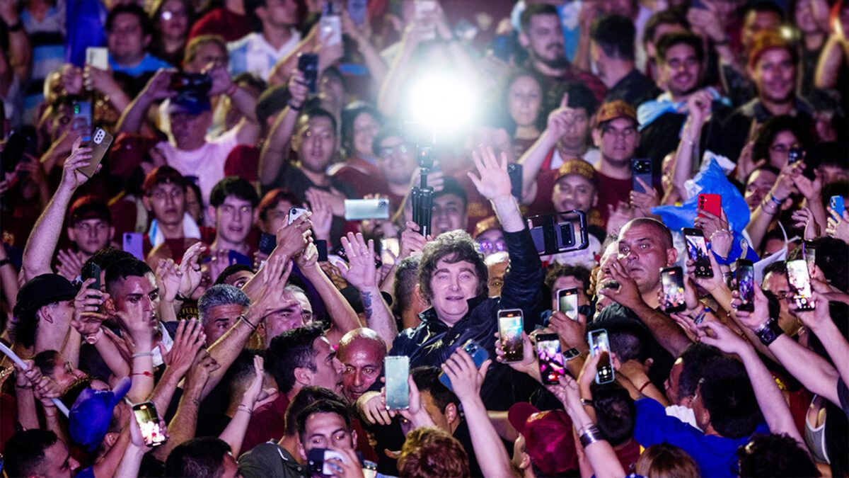 Javier Milei amidst a large crowd | Tomas Cuesta/Getty