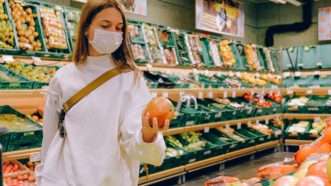 woman-wearing-mask-in-supermarket-Pexels