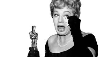 1 | Shelley Winters accepts the award for best supporting actress in 1960; Everett Collection