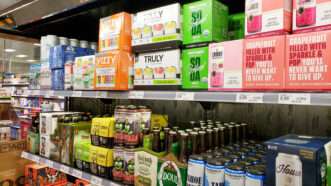 Vizzy | Photo <a href="https://www.dreamstime.com/view-several-featured-alcohol-brands-sitting-shelf-display-case-local-grocery-store-los-angeles-california-you-can-image187460569">187460569</a> © <a href="https://www.dreamstime.com/david68967_info" itemprop="author">David Tonelson</a> - <a href="https://www.dreamstime.com/">Dreamstime.com</a>