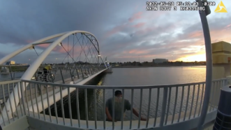 Tempe police body camera footage shows Sean Bickings jumping in lake | Screenshot/Tempe police body-cam footage