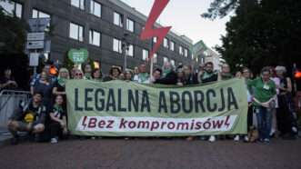Pro-abortion protesters assemble outside of Poland's parliament