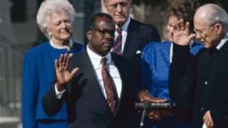 Supreme Court Justice Clarence Thomas being sworn in | MEGA / Newscom