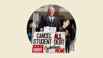 Demonstrators hold signs in favor of canceling student debt