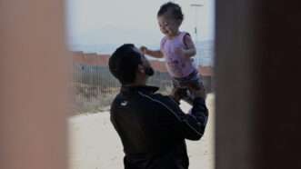 Migrants border wall San Diego | Carlos A. Moreno/ZUMAPRESS/Newscom