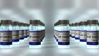 COVID-19 vaccine | RICHARD JONES/SCIENCE PHOTO LIBRARY/Newscom
