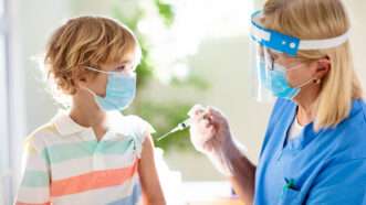 Getting the vaccine | Dreamstime