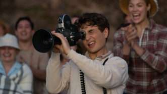 Gabriel LaBelle is seen with a camera playing Sammy Fabelman in Steven Spielbergs "The Fabelmans"