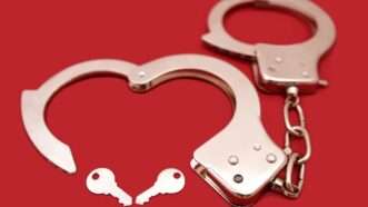 Handcuffs with key | Kevinmaloney / Dreamstime.com