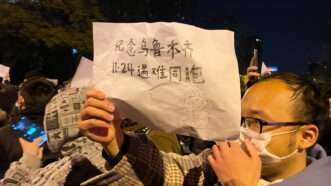 Beijing protest against "zero COVID" policies | Stringer/ZUMAPRESS/Newscom