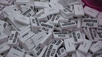 Boxes that say "Abortion Pills" and contain information about abortion-inducing drugs | Gina M Randazzo/ZUMAPRESS/Newscom