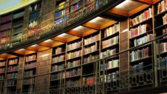 Bookshelves in a British library/reading room. | Zdenek Buk | Dreamstime.com