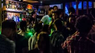 A crowded bar on a weekend night