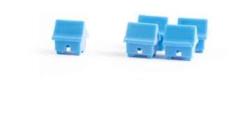 White background with tiny blue plastic houses