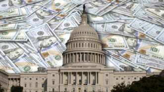 The U.S. Capitol building is seen with money behind it