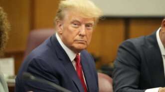 Former President Donald Trump sits in a New York City courtroom during his arraignment. | Steven Hirsch - Pool via CNP/picture alliance / Consolidated News Photos/Newscom