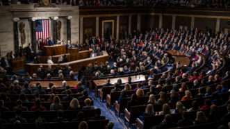 Congress watching Biden's State of the Union speech. | Samuel Corum/Sipa USA/Newscom
