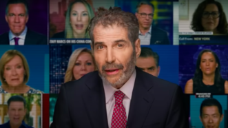 John Stossel is seen in front of television screens with multiple journalists