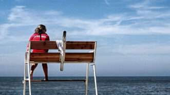 A lifeguard is seen at the beach | Man Fredrichter