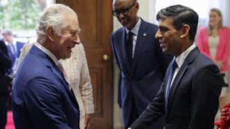 King Charle shaking hands with U.K. Prime Minister Rishi Sunak. | Chris Jackson / Avalon/Newscom