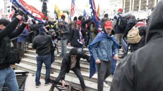 Violent pro-Trump protesters clash with law enforcement on the steps of the Capitol, January 6, 2021. | Brian Branch Price/ZUMAPRESS/Newscom