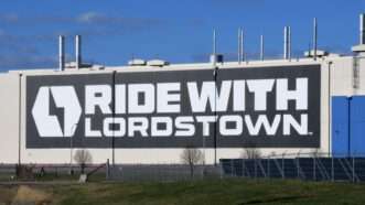 Lordstown Motors' Ohio plant, with a large "RIDE WITH LORDSTOWN" banner on the side. | Mark Hertzberg/ZUMAPRESS/Newscom