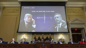 A projector screen at a congressional hearing showing Donald Trump | Alex Wong - Pool via CNP/ZUMAPRESS/Newscom