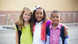 Racially diverse trio of elementary school children. | Yobro10 | Dreamstime.com