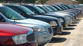 SUVs in a line on a lot | Photo 908369 © Michael Shake | Dreamstime.com