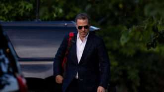 Hunter Biden walks with a shoulder bag in Washington D.C. | Pool/ABACA/Newscom