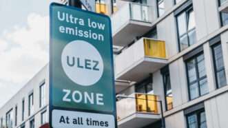A sign on a London road designating the area an Ultra Low Emission Zone (ULEZ). | AlenaKravchenko | Dreamstime.com