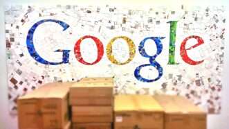The google logo on a wall with packing boxes in front of it | Photo 35205367 © Serban Enache | Dreamstime.com