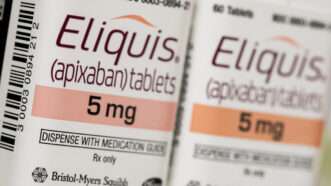 An up-close photo of Eliquis pill bottles | Kris Tripplaar/Sipa USA/Newscom