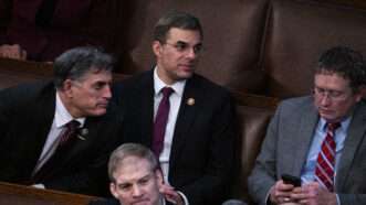 Former congressman Justin Amash, center, on the House floor in January 2023 with Reps. Andrew Clyde, R-Ga., left, Thomas Massie, R-Ky., right, and Jim Jordan, R-Ohio. | Tom Williams/CQ Roll Call/Newscom