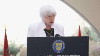 Janet Yellen speaks from a lectern at meeting in Morocco | Kyodo/Newscom