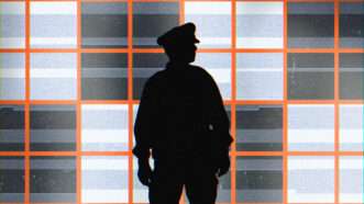 Policeman standing in front of bars | Lex Villena