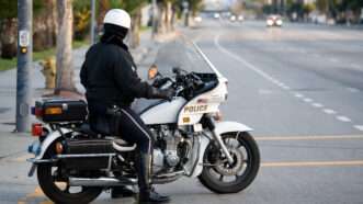 A police officer on a motorcycle | Photo 649824 © Mylightscapes | Dreamstime.com