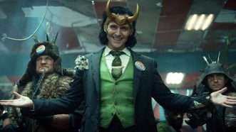The character Loki smiling in a screenshot from the TV show 'Loki' on Disney+. | <em>Loki</em>/Disney+