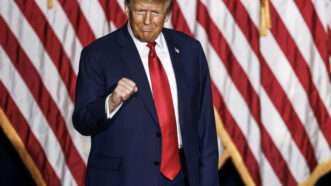 Trump stands in front of an American flag | TANNEN MAURY/UPI/Newscom