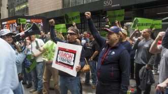 Union protesters on a picket line in Manhattan. | Vonora | Dreamstime.com