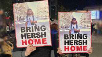 Protesters in Israel hold a poster of a young hostage with text that reads, "Bring Hersh Home." | Photo: Nancy Rommelmann