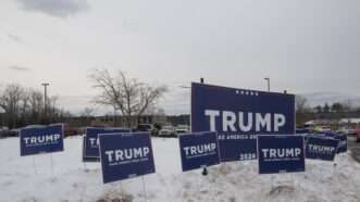 Trump signs in New Hampshire | Amanda Sabga/UPI/Newscom