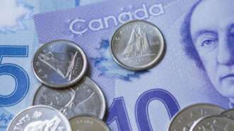 Canadian money, both cash and coins. | Embe2006 | Dreamstime.com