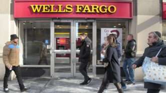 Pedestrians walk by a Wells Fargo in Manhattan | Jimin Kim / SOPA Images/Sipa USA/Newscom