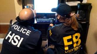 Department of Homeland Security Investigations and FBI conduct a search during a Joint Criminal Opioid and Darknet Enforcement (JCODE) team operation in 2021. | FBI