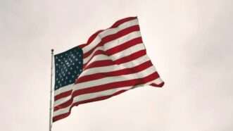 American Flag blowing in the breeze | Joshua Hoehne / Unsplash