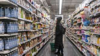 Person shopping in grocery store | Rob Levine/Newscom